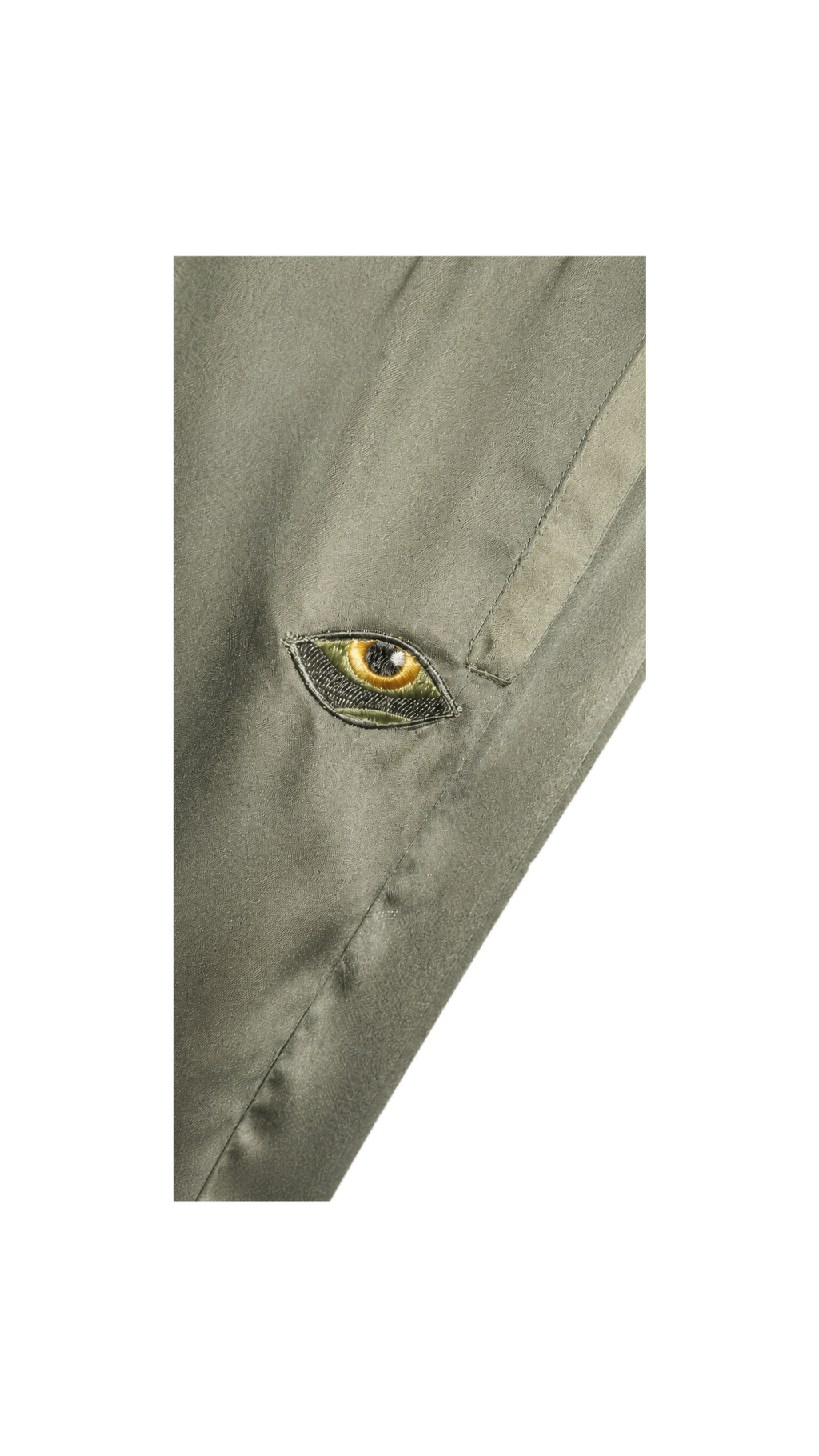 les aristochats Ashera unisex pants in green, close-up packshot